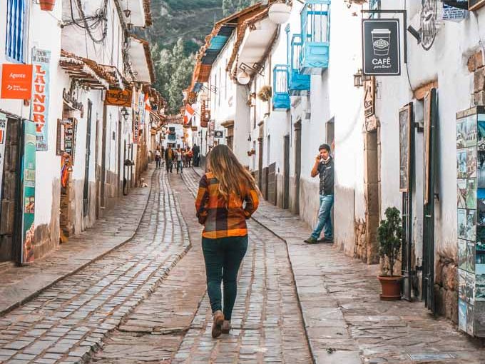 A female walking down the streets of the San Blas neighborhood in Cusco, Peru