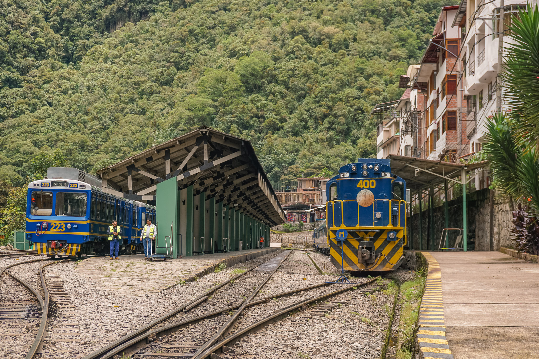 A train moving on the tracks in Aguas Calientes, Peru